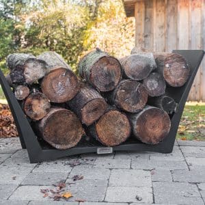Log rack full of fire wood on a patio