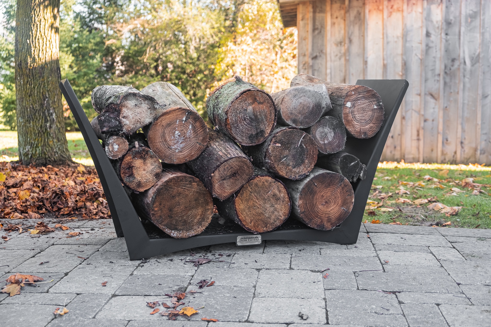 Log rack full of fire wood on a patio