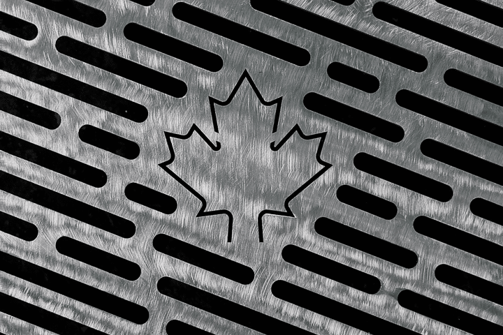 Carbon steel bbq grill with a Maple leaf cutout for a outdoor fire pit