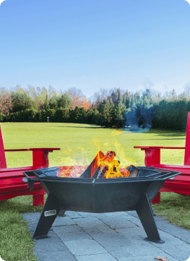3' cottager fire pit with red chairs.