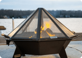3' cottager fire pit and stainless spark screen by the lake.