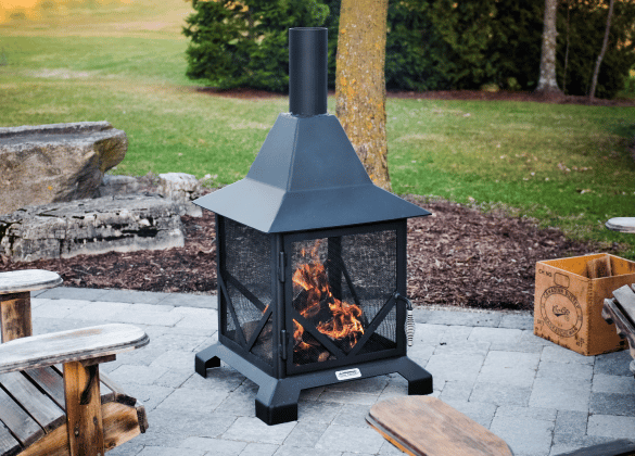 Chiminea fire pit on a large patio.