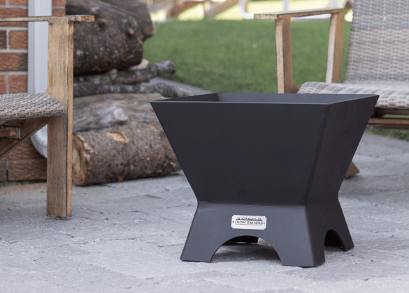 Small modern square shaped fire pit for a residential backyard