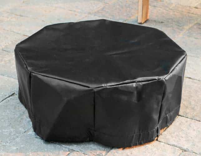 Vinyl tarp cover for small fire pit on urban patio