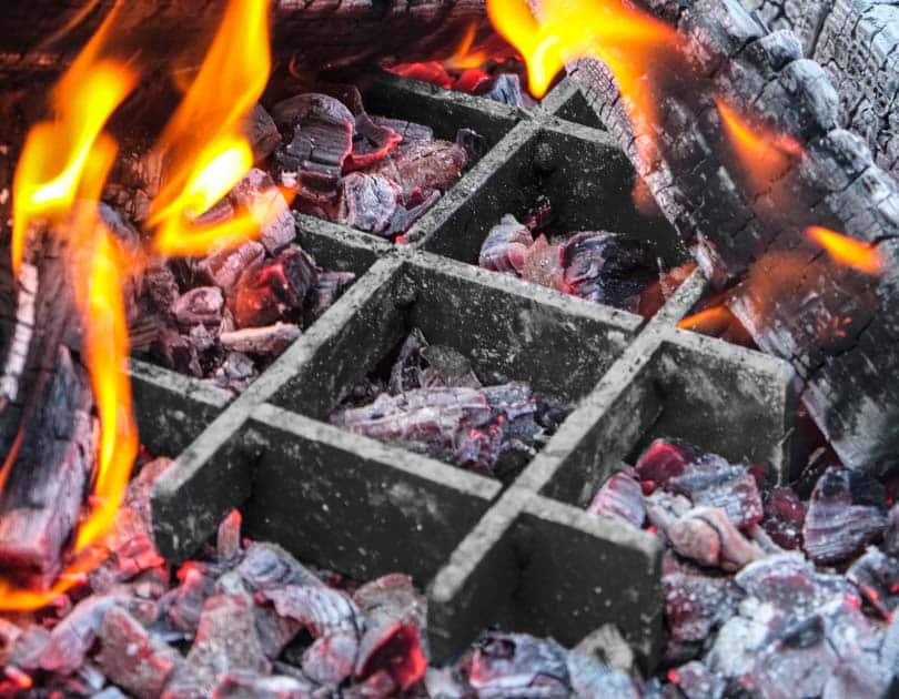 Small fire grate in the coals