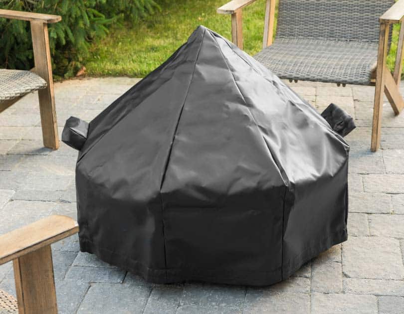 Form fitting weather cover for fire pit made from heavy vinyl