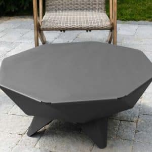 Fire pit with useful table top accessory on patio