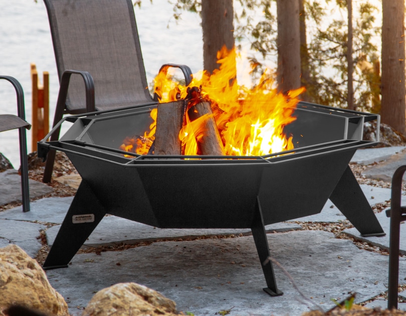 4' octagonal cottager fire pit near a lake