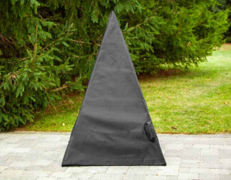 Vinyl tarp cover for 4' pyramid fire pit on patio