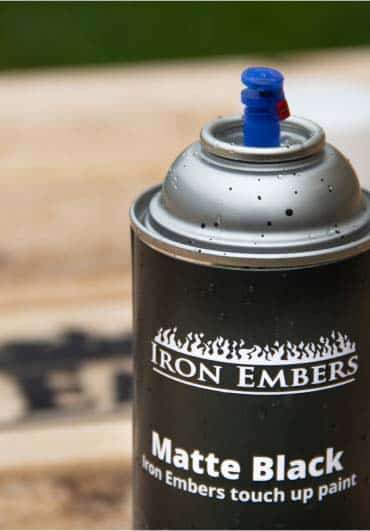 Iron Embers matte black touch-up paint can.