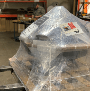 Cottager fire pit wrapped in shipping packaging